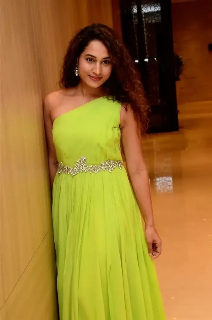 Indian Actress Pooja Ramachandran Images in Long Green Gown